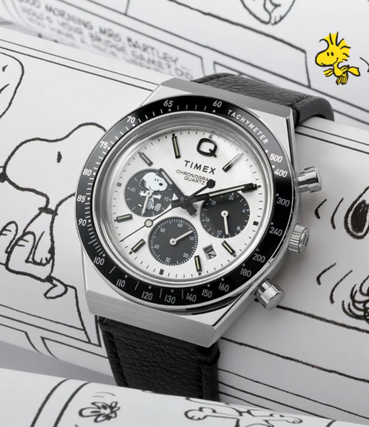 Timex chronograph quartz wristwatch with Snoopy subdial on a comic-strip backdrop